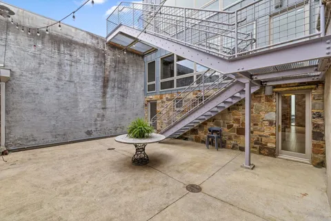 a view of a bench in a patio