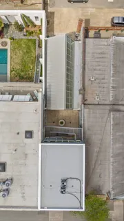 a balcony with tall buildings