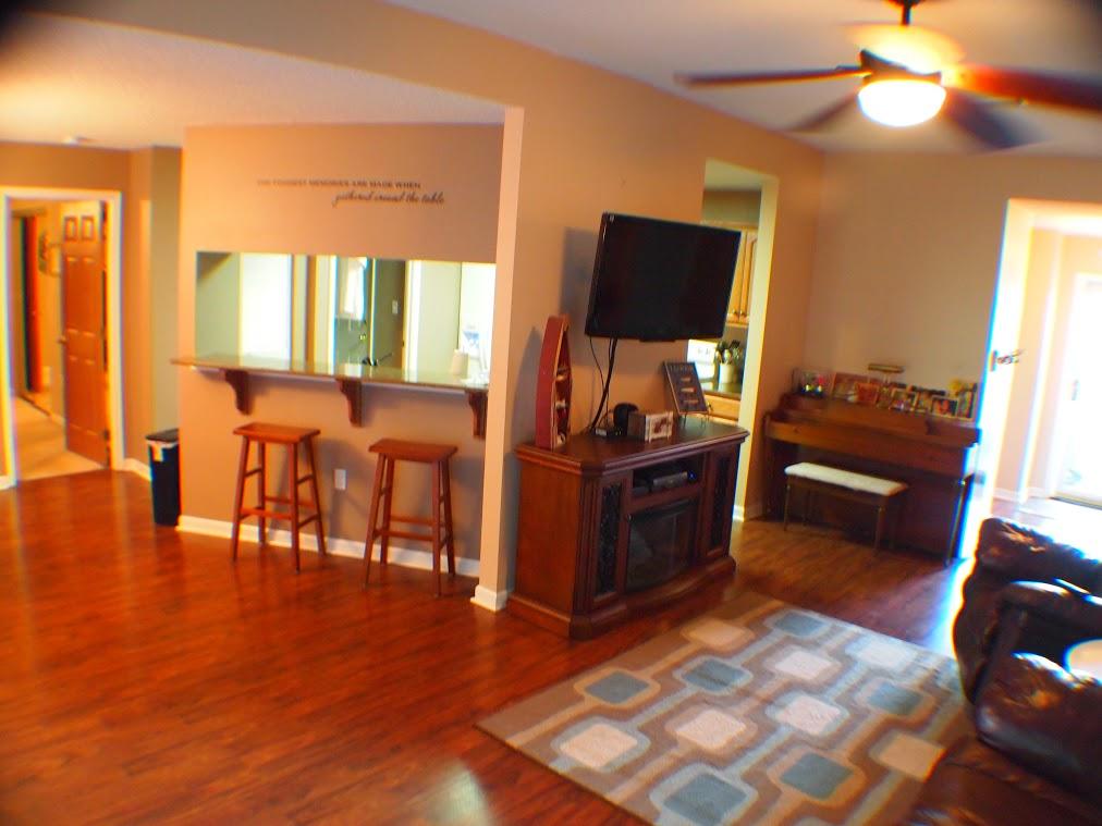 5220 Moore Loop Crestview, FL 32536 - Photo 15 of 24 a living room with furniture and a flat screen tv