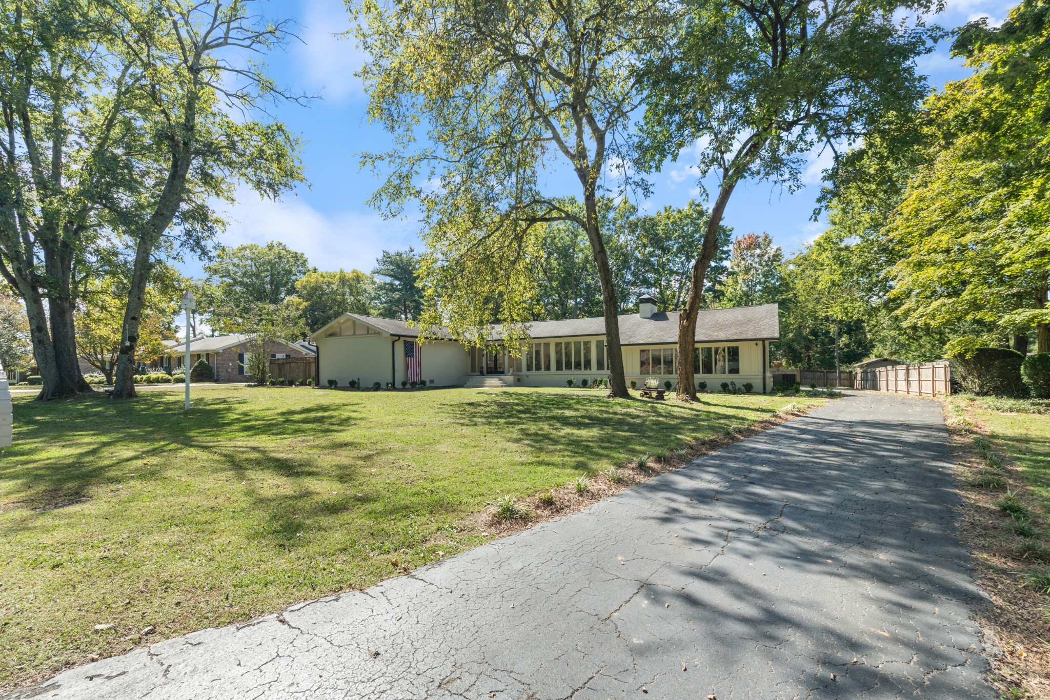 2315 London Avenue Murfreesboro, TN 37129 - Photo 1 of 65 a view of a yard with plants and trees