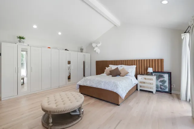 a bathroom with a shower and a bath tub