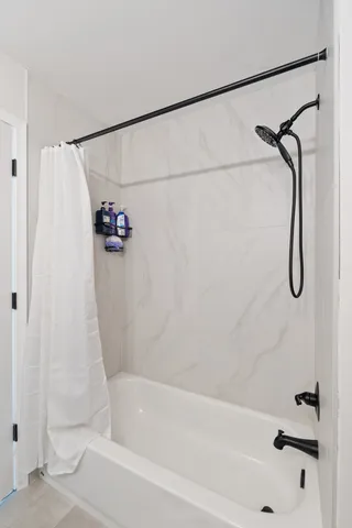 a kitchen with sink and refrigerator