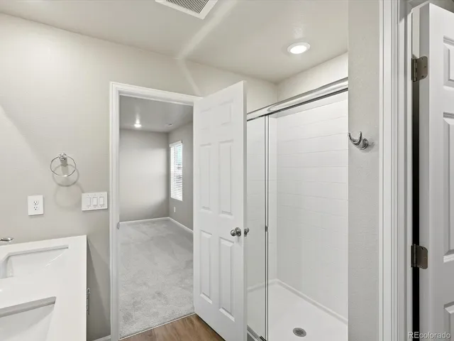 a view of a room with racks on the wall