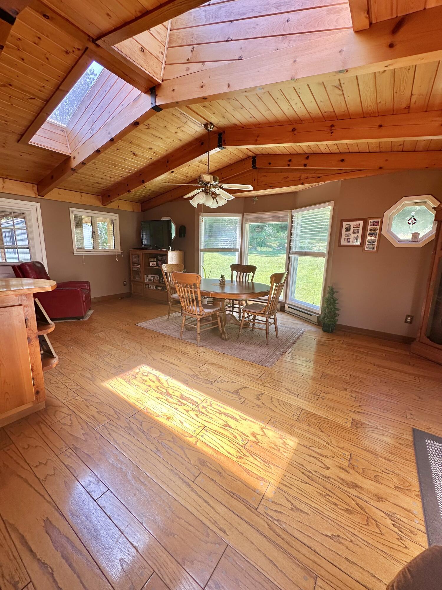 4801 Nicelytown Road Clifton Forge, VA 24422 - Photo 24 of 96 a view of a patio with table and chairs near a barbeque