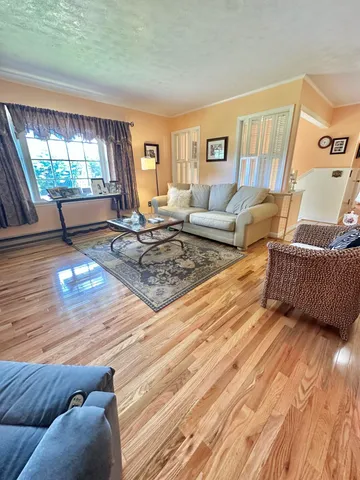 a bathroom with a tub a sink and a shower