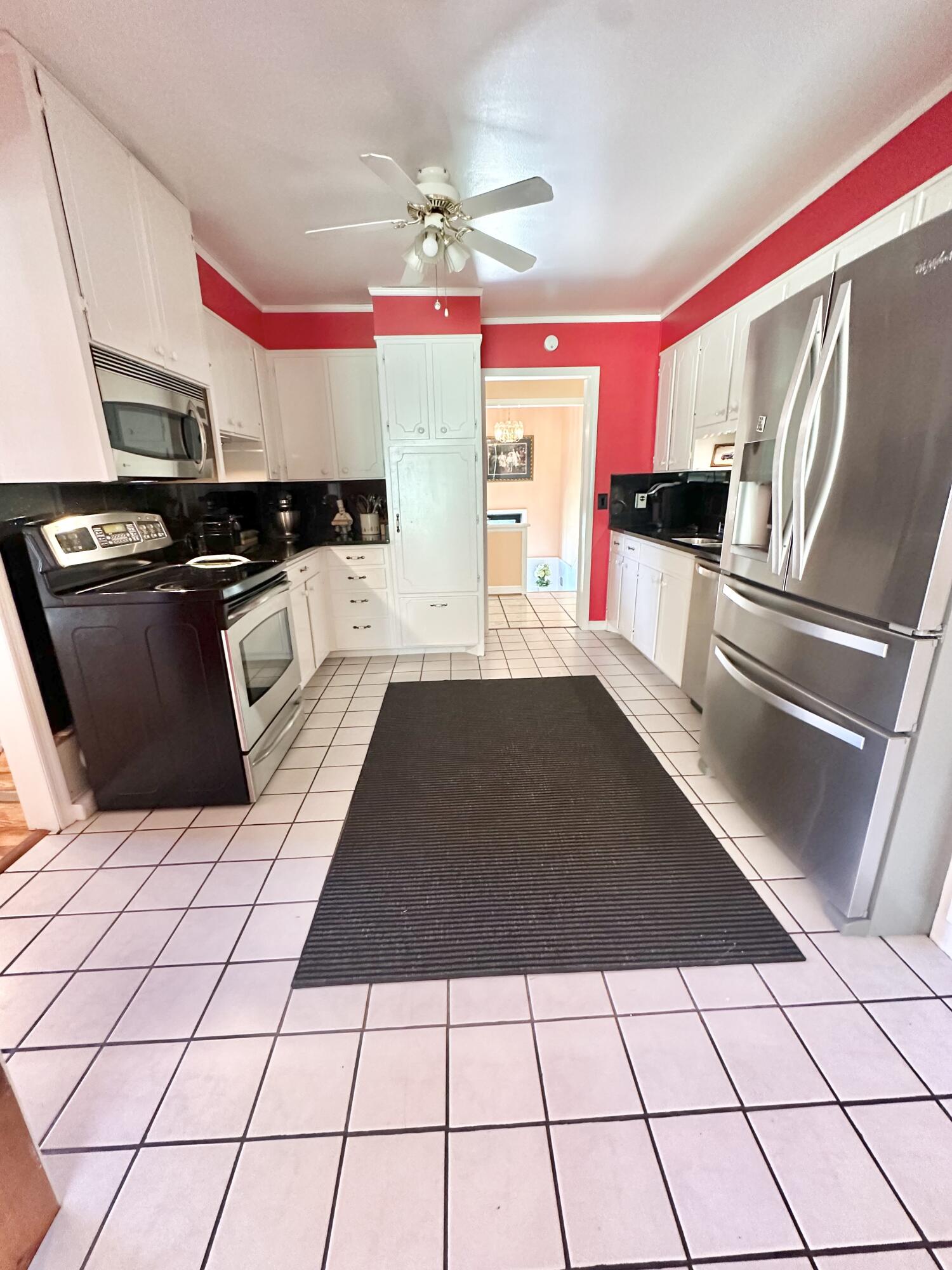 4801 Nicelytown Road Clifton Forge, VA 24422 - Photo 35 of 96 a kitchen with a sink and a stove top oven