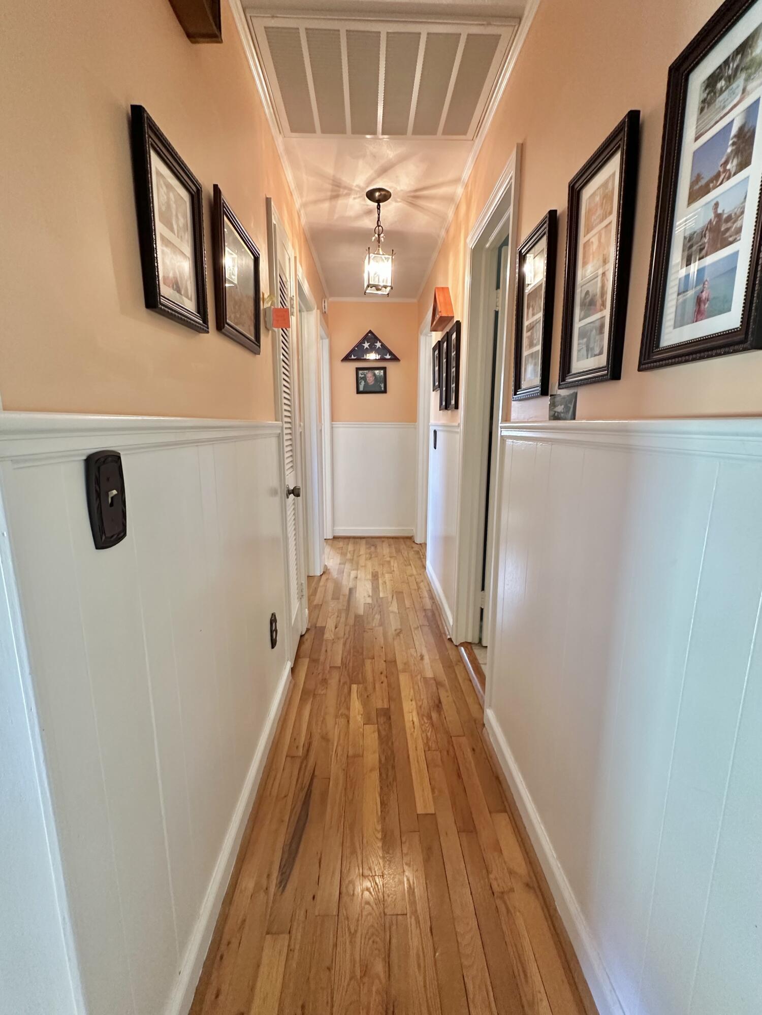 4801 Nicelytown Road Clifton Forge, VA 24422 - Photo 41 of 96 a view of a hallway with wooden floor and staircase