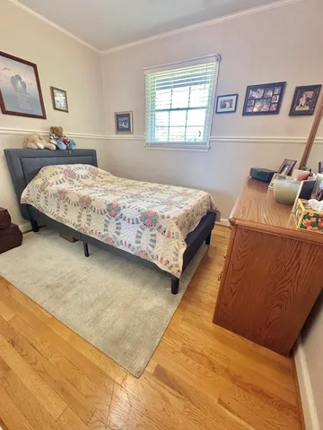 a view of a house with a yard and garage