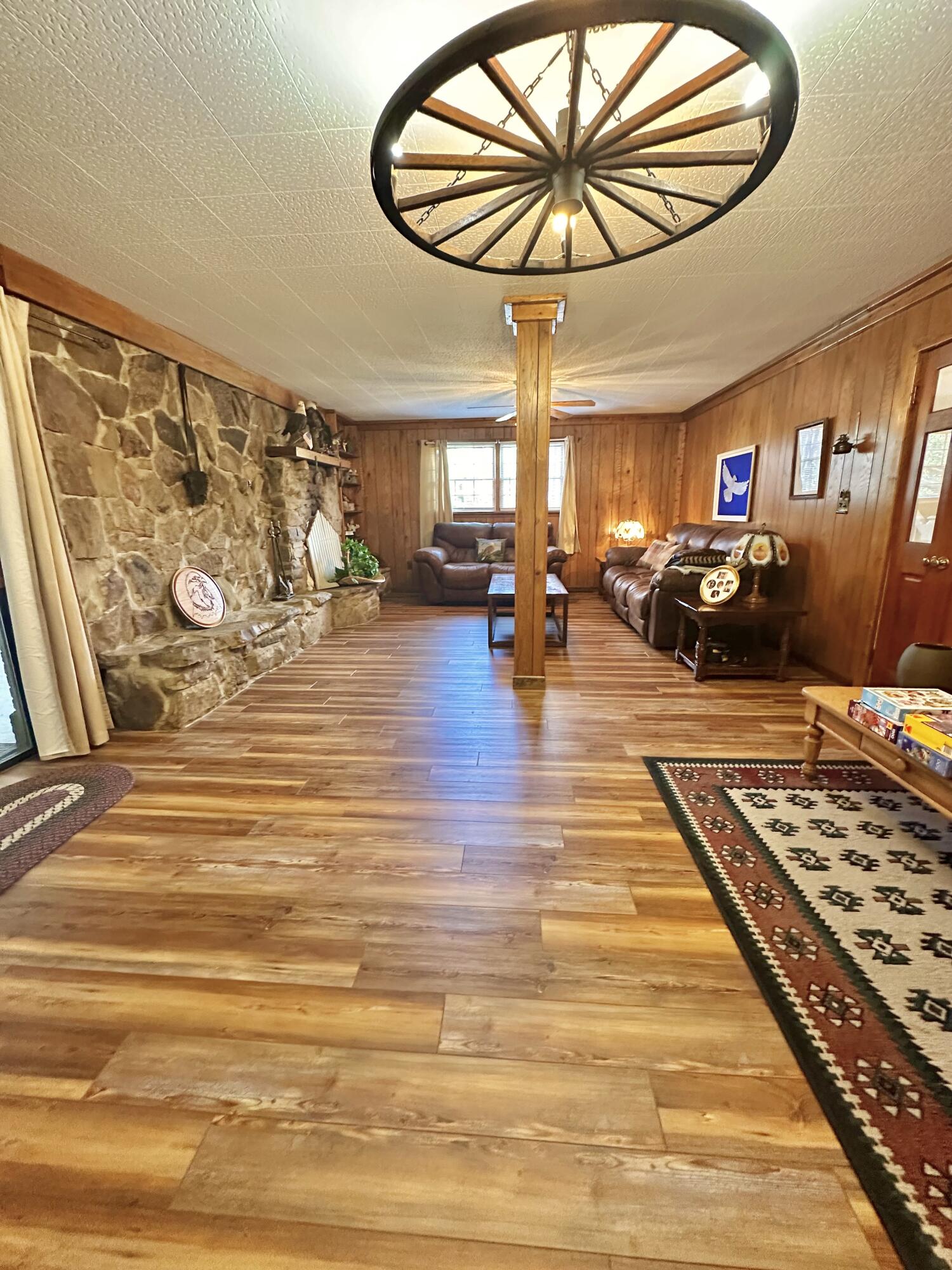 4801 Nicelytown Road Clifton Forge, VA 24422 - Photo 50 of 96 a very nice looking room with couch and a chandelier