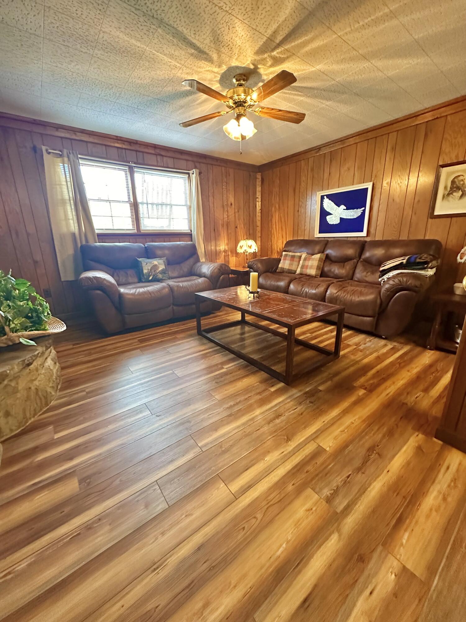 4801 Nicelytown Road Clifton Forge, VA 24422 - Photo 53 of 96 a living room with furniture and a chandelier