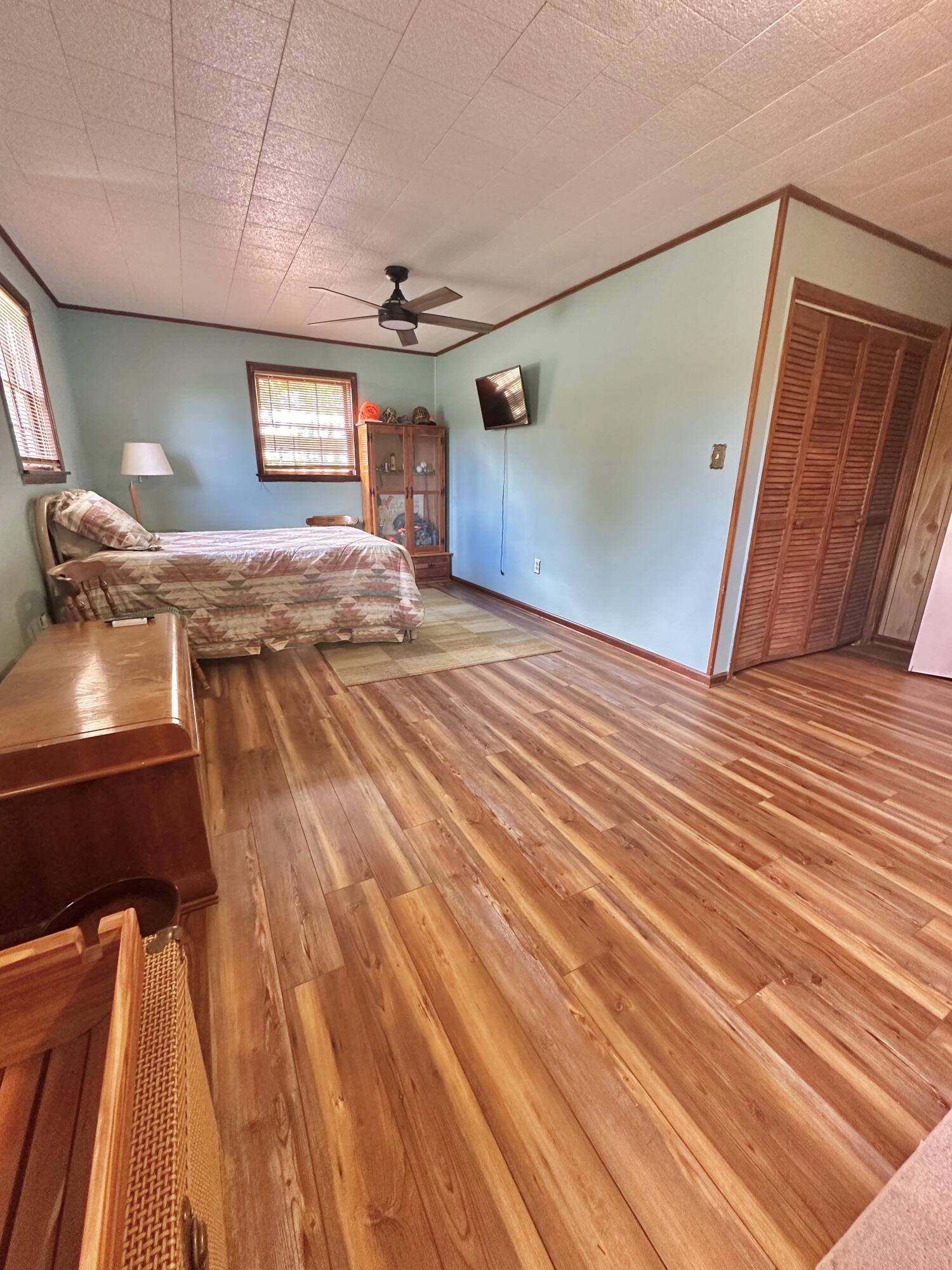4801 Nicelytown Road Clifton Forge, VA 24422 - Photo 55 of 96 a view of an empty room with window and wooden floor