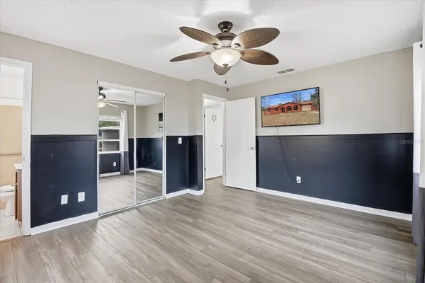 a view of a livingroom with a kitchen