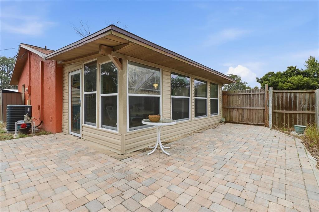 2341 South Whitier Point Homosassa, FL 34448 - Photo 31 of 36 a view of house with large windows and a yard