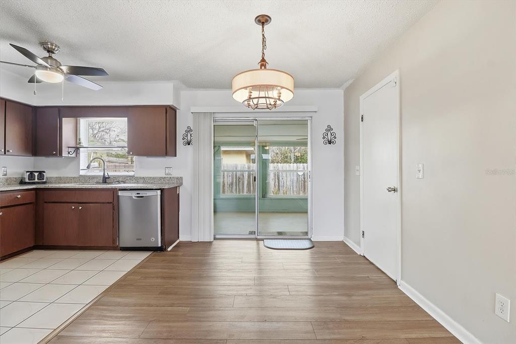 2341 South Whitier Point Homosassa, FL 34448 - Photo 10 of 36 a view of a kitchen with a sink and wooden floor