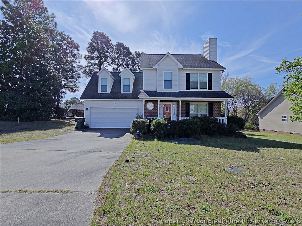 5218 Pringle Way Hope Mills, NC 28348 - Photo 35 of 43 a front view of a house with a yard