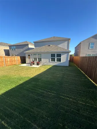 a view of a house with a big yard