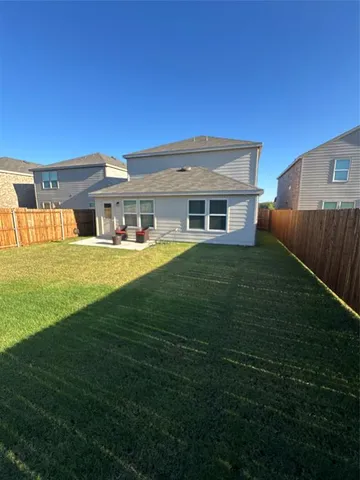 a view of a house with a big yard