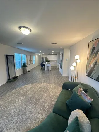 a living room with furniture and a couch