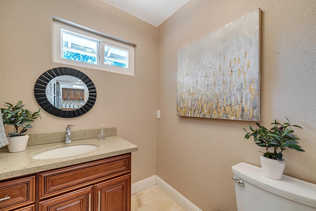 3151 Stone Valley Road Danville, CA 94526 - Photo 25 of 41 a bathroom with a sink and a mirror