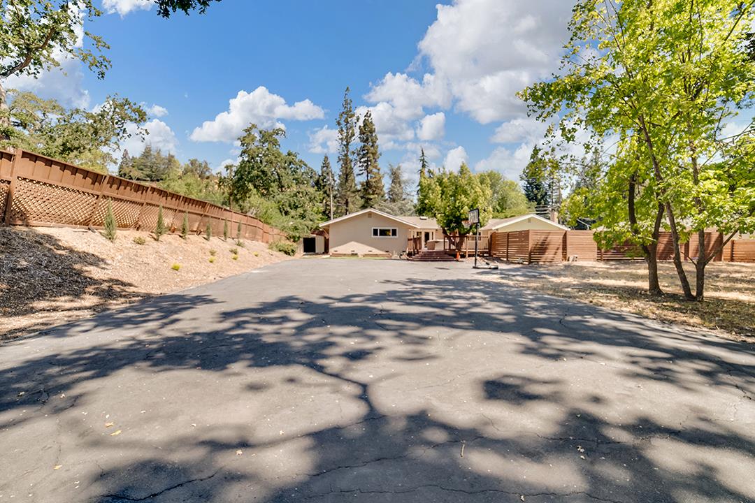 3151 Stone Valley Road Danville, CA 94526 - Photo 7 of 41 a view of a white house with a yard