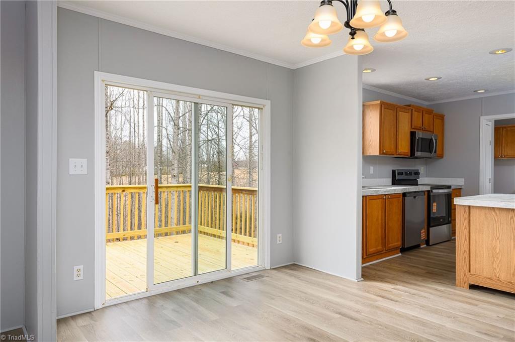 1591 Carson Road Pilot Mountain, NC 27041 - Photo 34 of 50 Dining area with sliding doors out to new deck