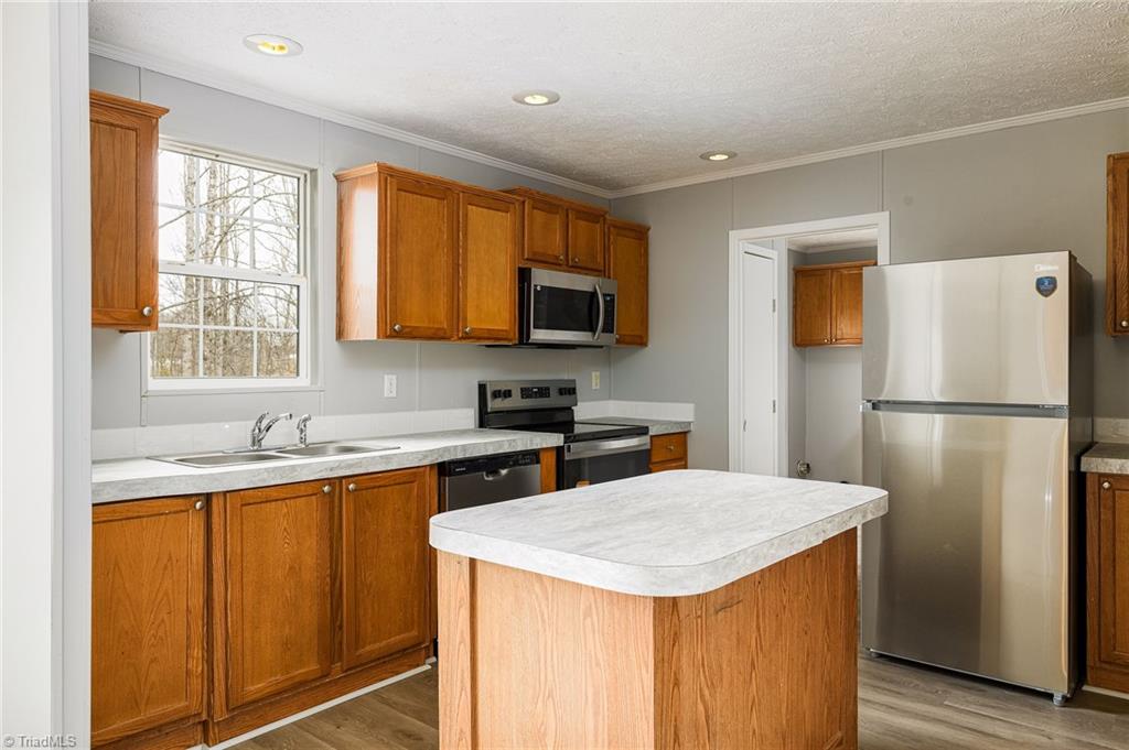 1591 Carson Road Pilot Mountain, NC 27041 - Photo 35 of 50 All new countertops plus new deep sink and new faucet has been replaced!