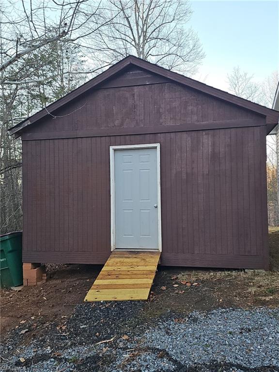 1591 Carson Road Pilot Mountain, NC 27041 - Photo 6 of 50 Very large storage building newly painted with a new ramp