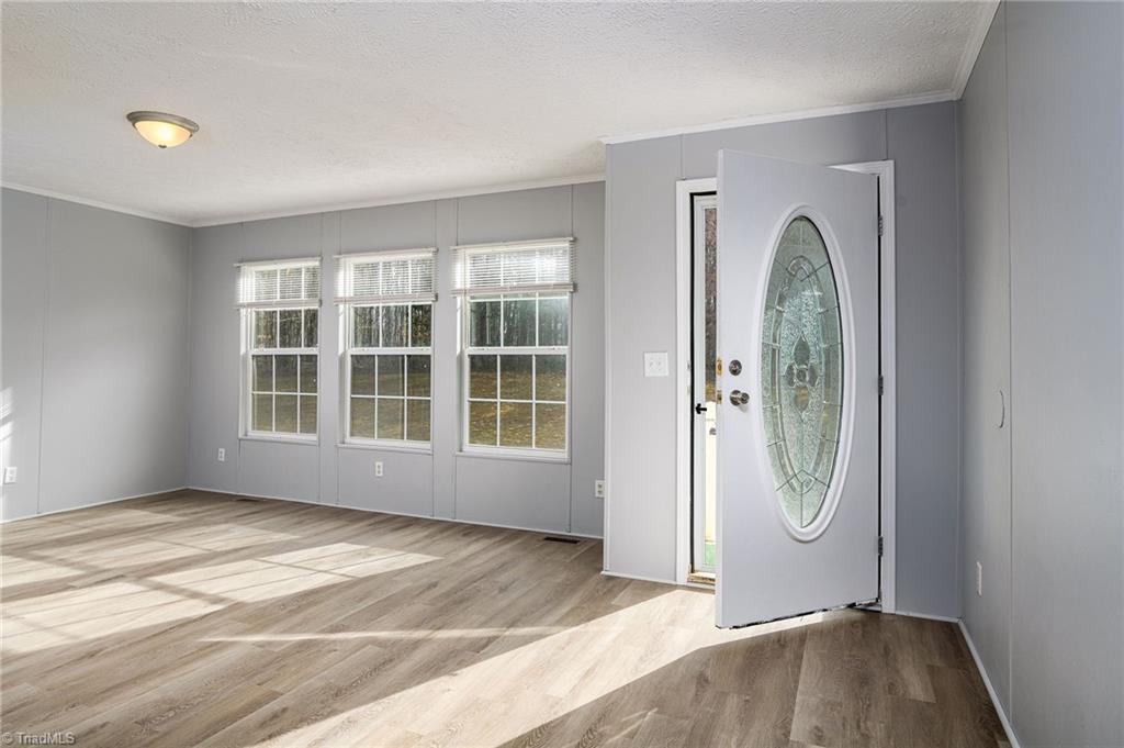 1591 Carson Road Pilot Mountain, NC 27041 - Photo 9 of 50 Tons of windows offer so much natural lighting throughout the home