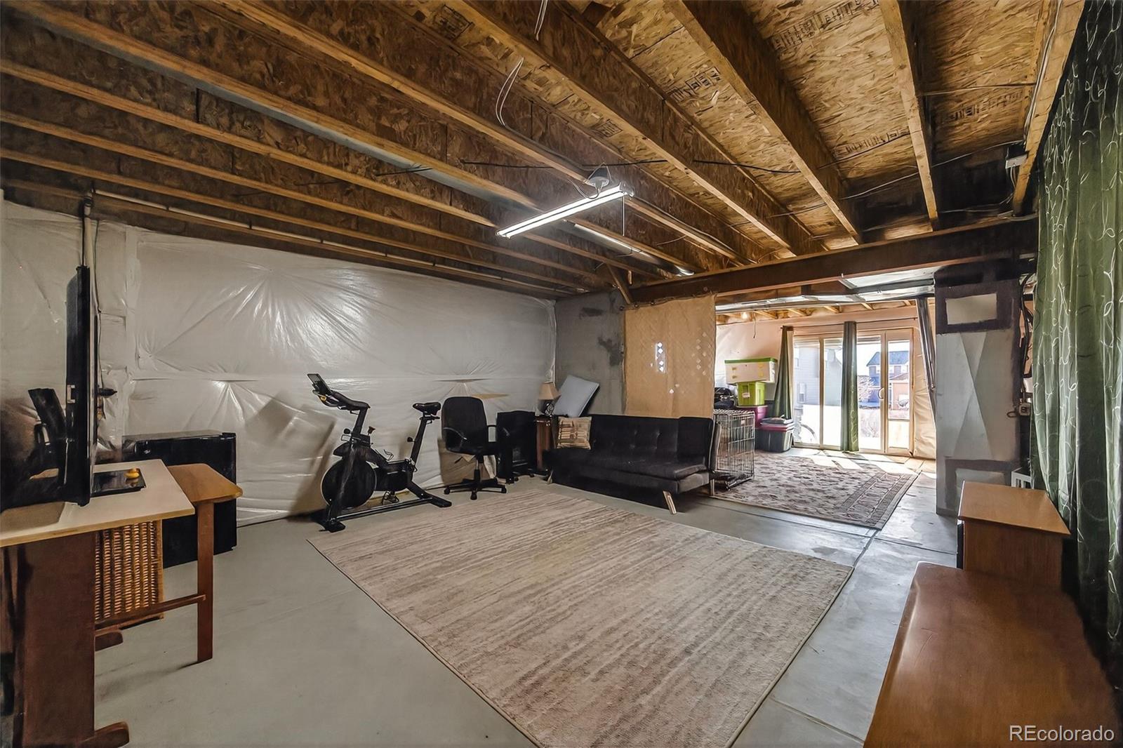 10247 Olathe Way Commerce City, CO 80022 - Photo 28 of 37 a view of gym equipment