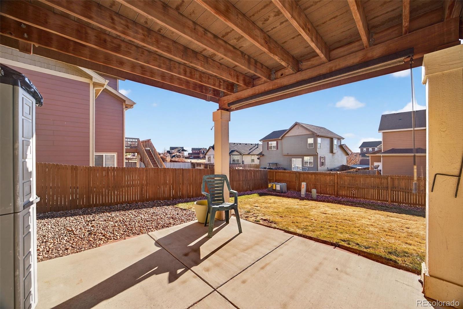 10247 Olathe Way Commerce City, CO 80022 - Photo 30 of 37 a view of a balcony with couch