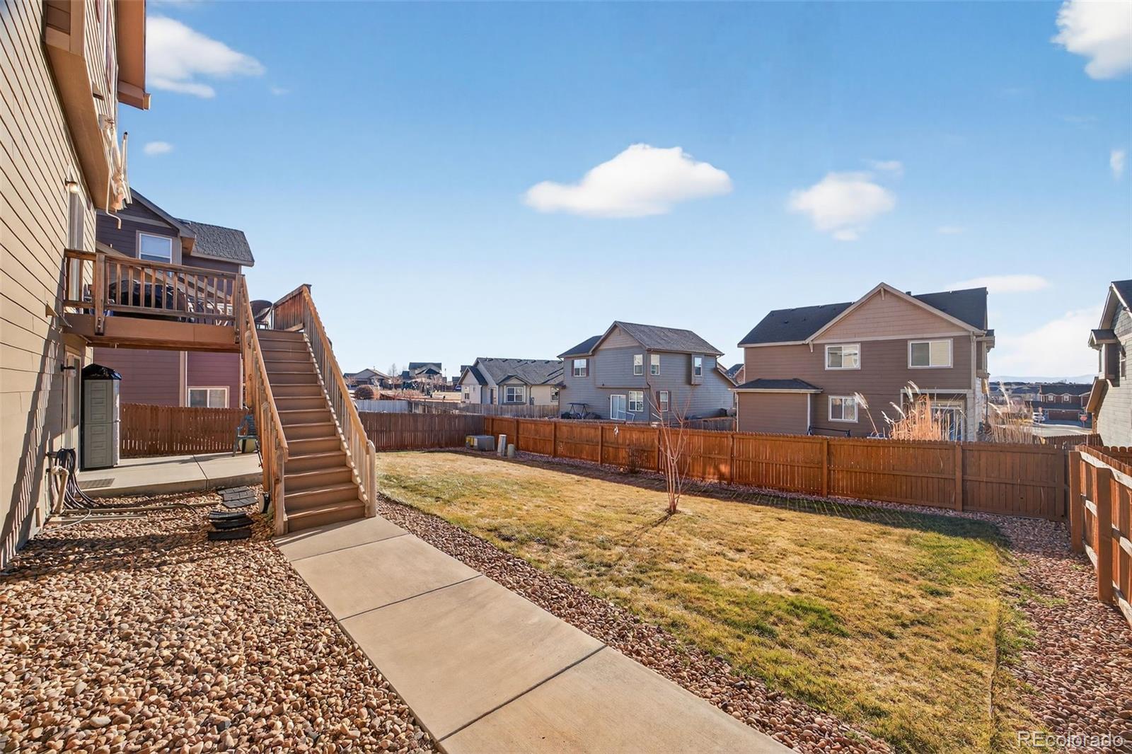 10247 Olathe Way Commerce City, CO 80022 - Photo 34 of 37 a view of houses with sky view