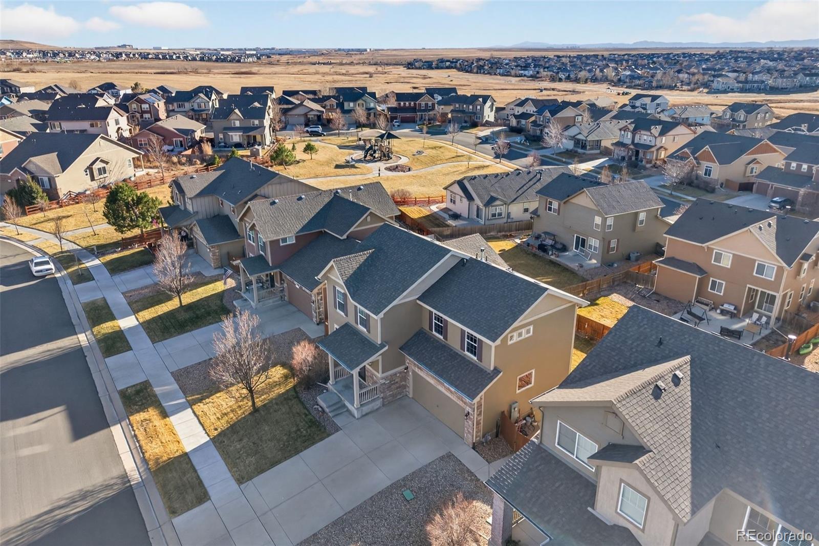10247 Olathe Way Commerce City, CO 80022 - Photo 37 of 37 an aerial view of a building with parking space