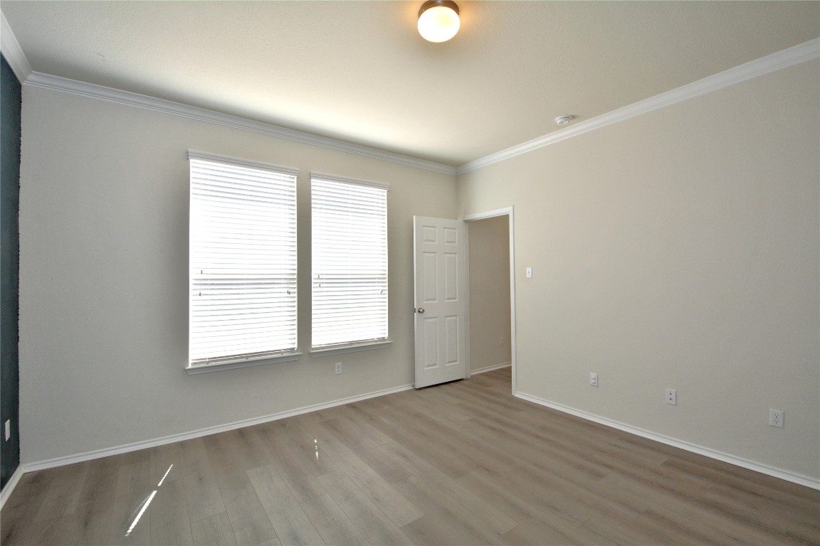 113 Thrasher Cove Leander, TX 78641 - Photo 11 of 19 Primary bedroom