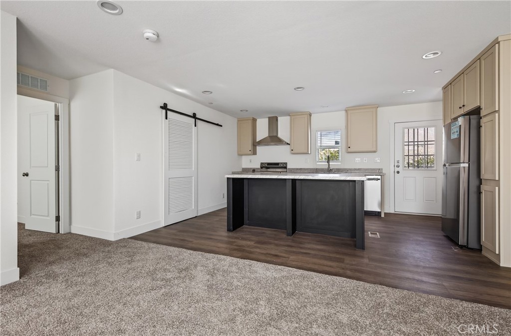13425 Mesquite Road Whitewater, CA 92282 - Photo 13 of 26 a kitchen with stainless steel appliances granite countertop a sink stove and refrigerator