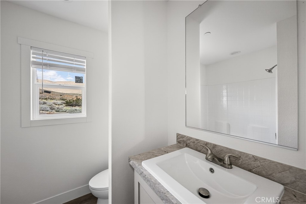 13425 Mesquite Road Whitewater, CA 92282 - Photo 24 of 26 a bathroom with a sink and a toilet