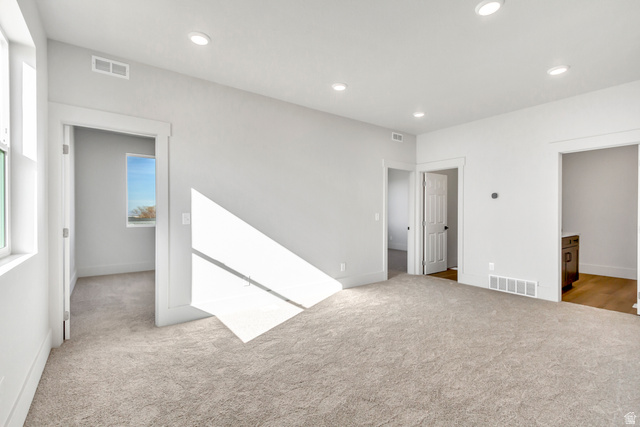 547 North Hvn Drive Mapleton, UT 84664 - Photo 17 of 23 Spare room featuring light colored carpet and recessed lighting