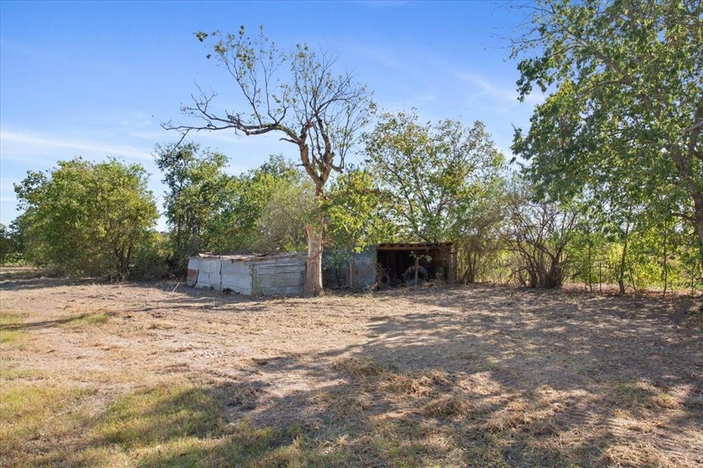 100 County Road 120 C Riesel, TX 76682 - Photo 24 of 25 View of yard featuring an outdoor structure and a pole building