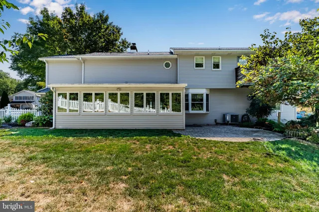 a view of a house with swimming pool