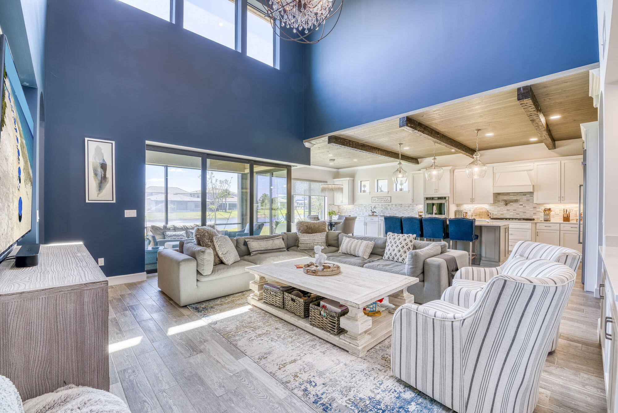 114 Cinder Dunes Point Jupiter, FL 33478 - Photo 14 of 62 a living room with furniture and a large window