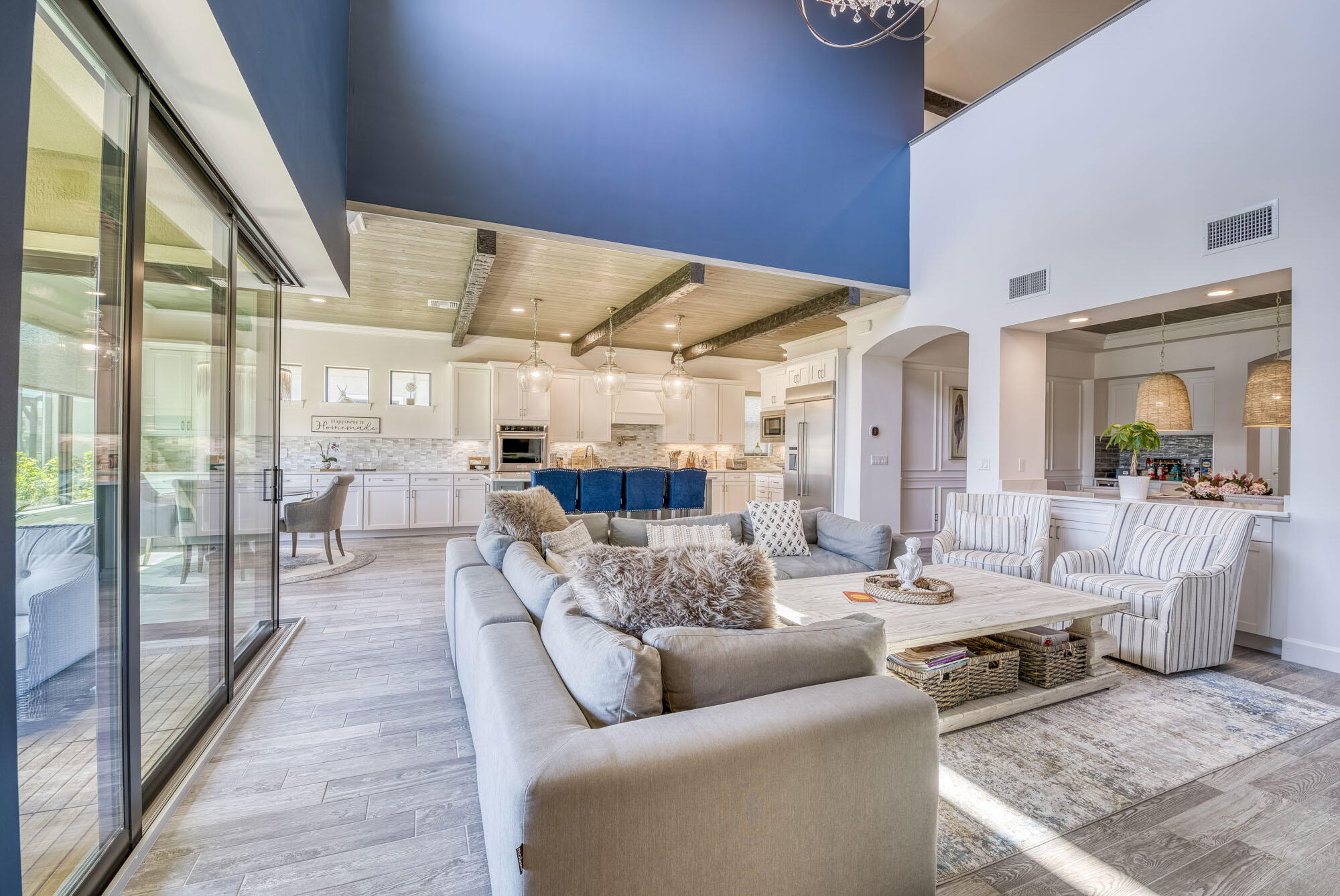 114 Cinder Dunes Point Jupiter, FL 33478 - Photo 15 of 62 a living room with furniture and a large window