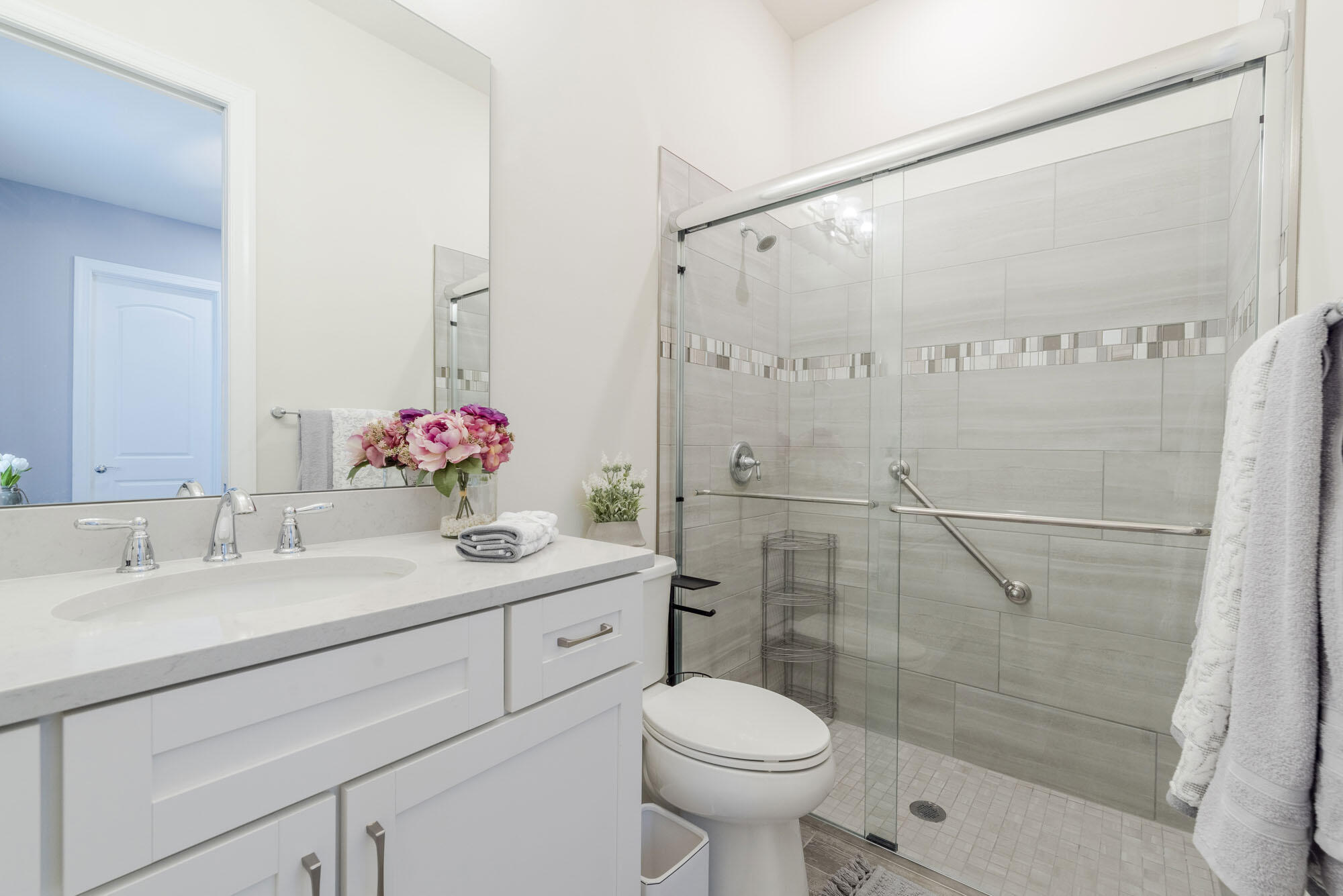 114 Cinder Dunes Point Jupiter, FL 33478 - Photo 22 of 62 a bathroom with a sink toilet and shower