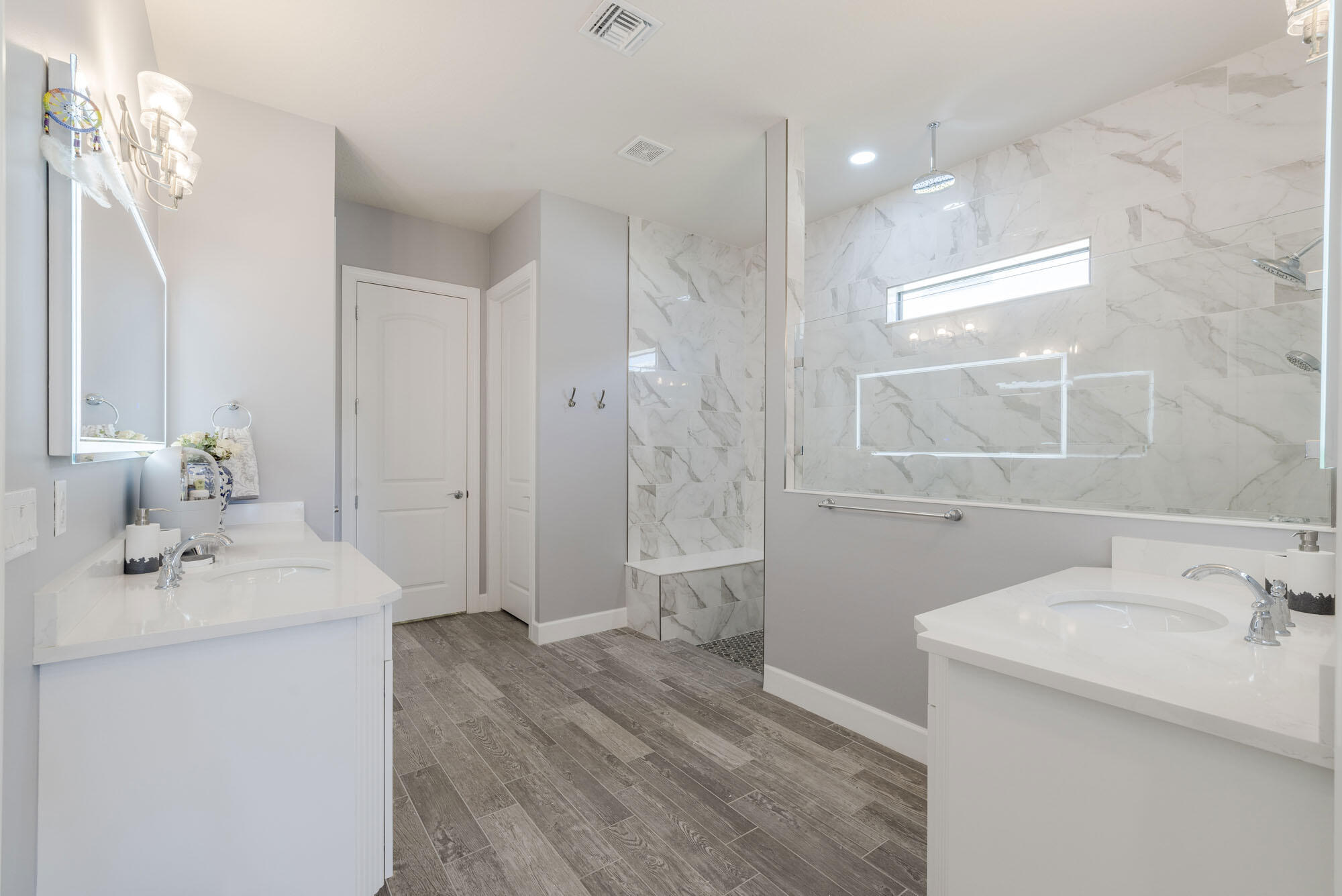 114 Cinder Dunes Point Jupiter, FL 33478 - Photo 27 of 62 a bathroom with a sink a toilet and shower