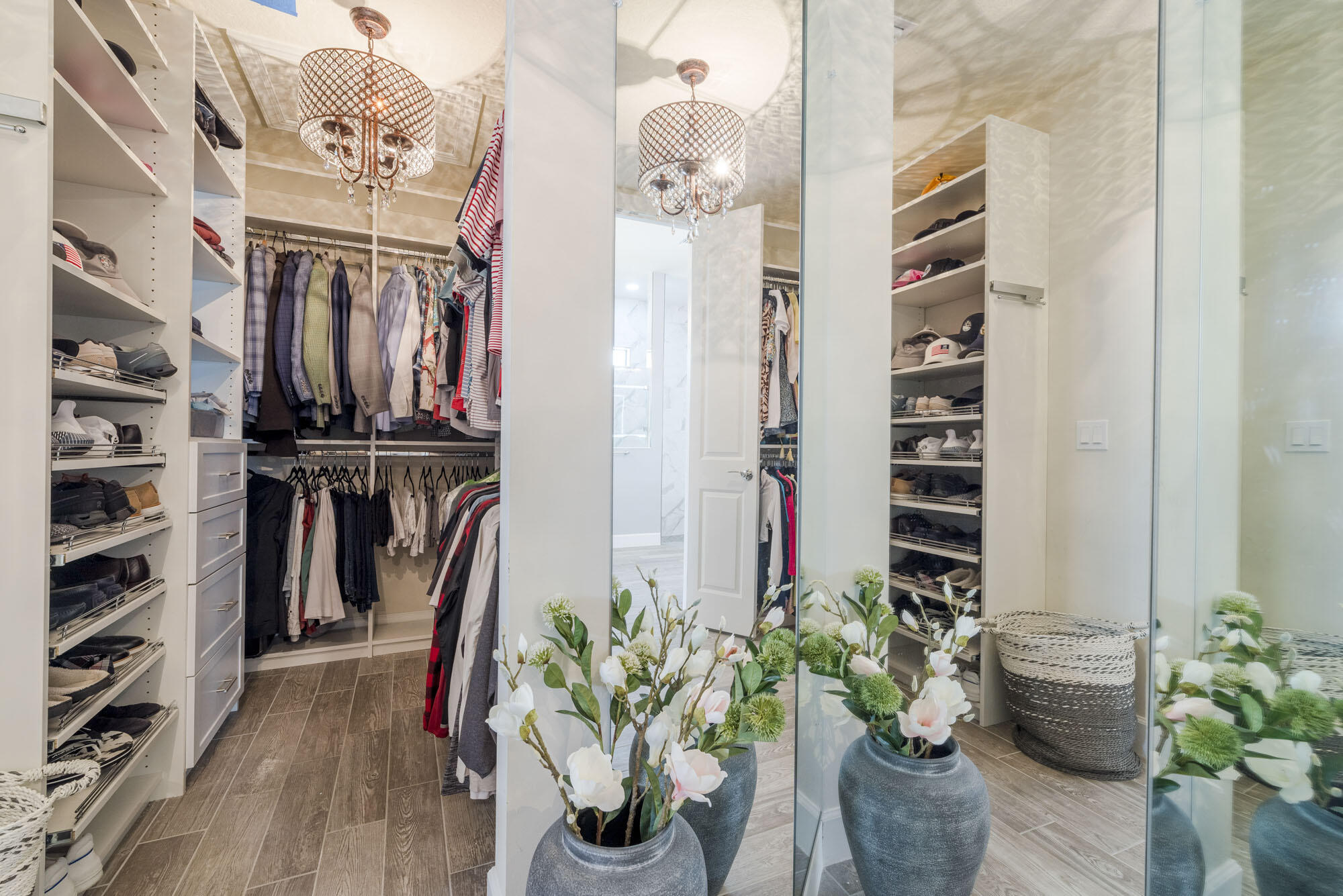 114 Cinder Dunes Point Jupiter, FL 33478 - Photo 31 of 62 a living room with furniture a potted plant and a book shelf