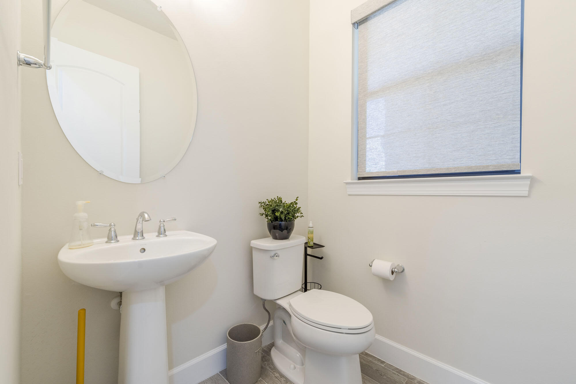 114 Cinder Dunes Point Jupiter, FL 33478 - Photo 36 of 62 a bathroom with a sink toilet and a mirror