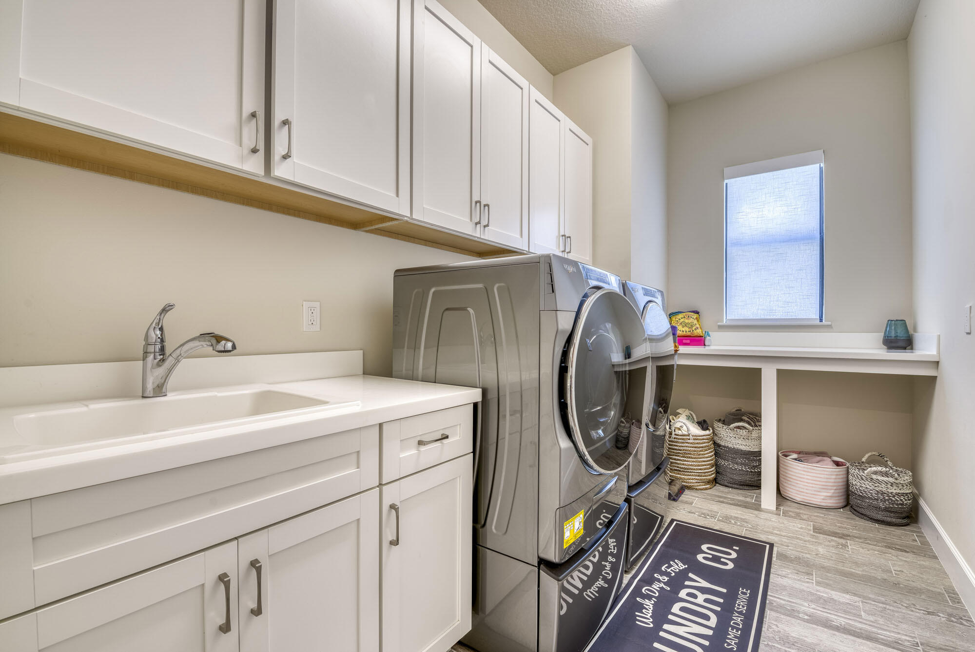 114 Cinder Dunes Point Jupiter, FL 33478 - Photo 37 of 62 a utility room with dryer and washer