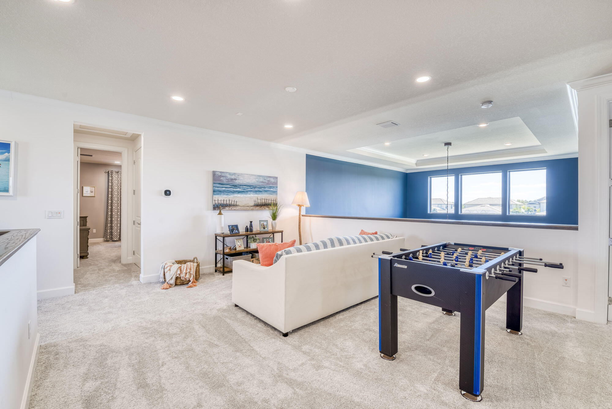 114 Cinder Dunes Point Jupiter, FL 33478 - Photo 45 of 62 a living room with furniture and a table