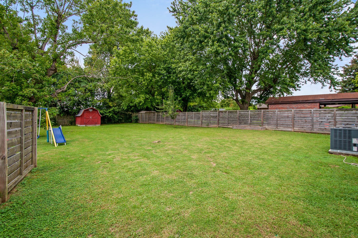 1014 Mitchell Road Nashville, TN 37206 - Photo 23 of 29 a view of a backyard with a small cabin