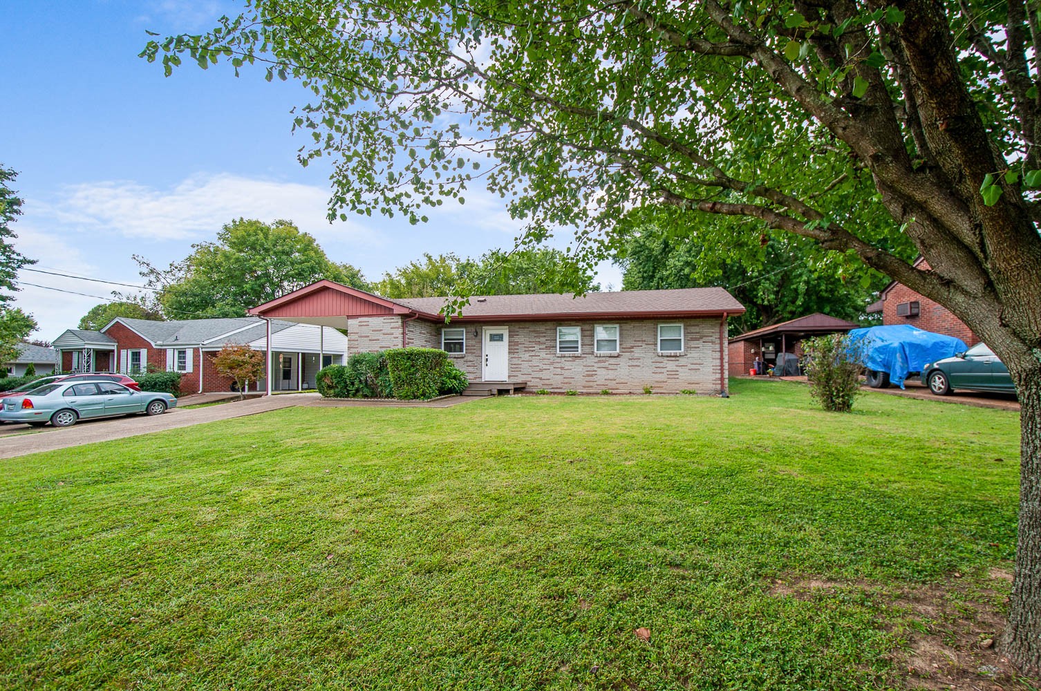 1014 Mitchell Road Nashville, TN 37206 - Photo 3 of 29 a front view of a house with garden