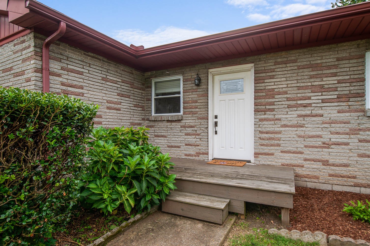 1014 Mitchell Road Nashville, TN 37206 - Photo 4 of 29 a brick house with a small entryway