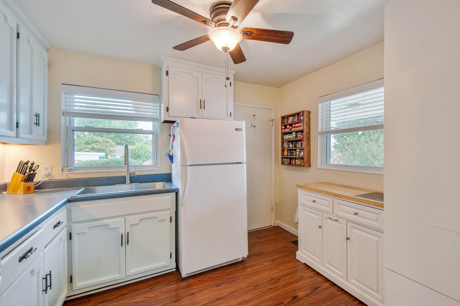 1014 Mitchell Road Nashville, TN 37206 - Photo 10 of 29 a kitchen with white cabinets and white appliances
